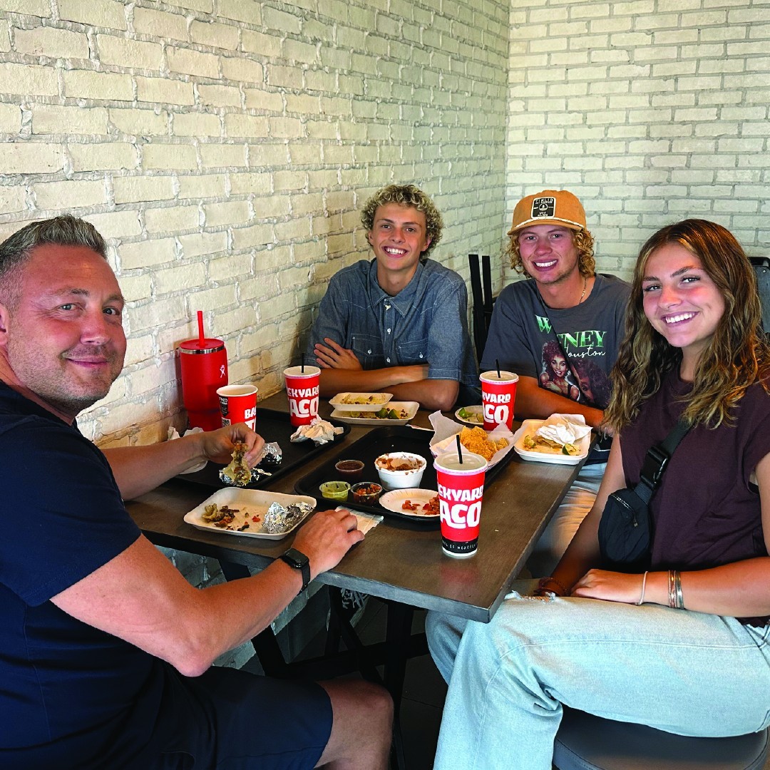 Backyard Taco Fans Eating Tacos