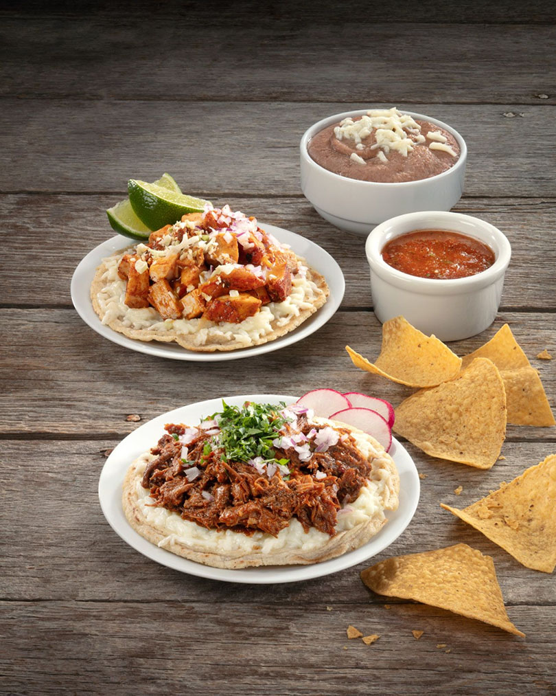 Grilled gorditas with meat, beans, salsa, and chips from Backyard Taco