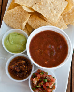 Backyard Taco burrito with chips, salsa, rice, beans, and drinks